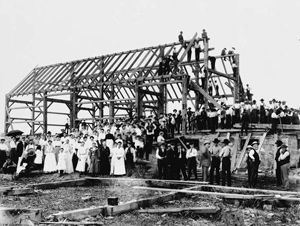 barn-raising-in-lansing_publicdomain